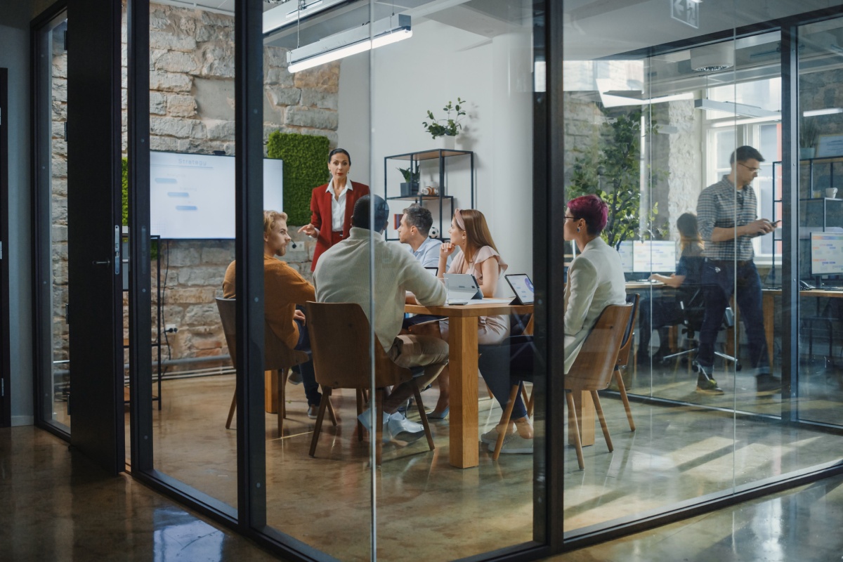 Team collaborating in a modern coworking meeting room